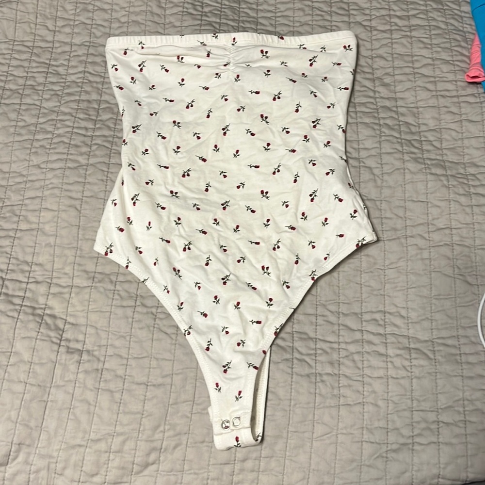 White with roses body suit. Size S